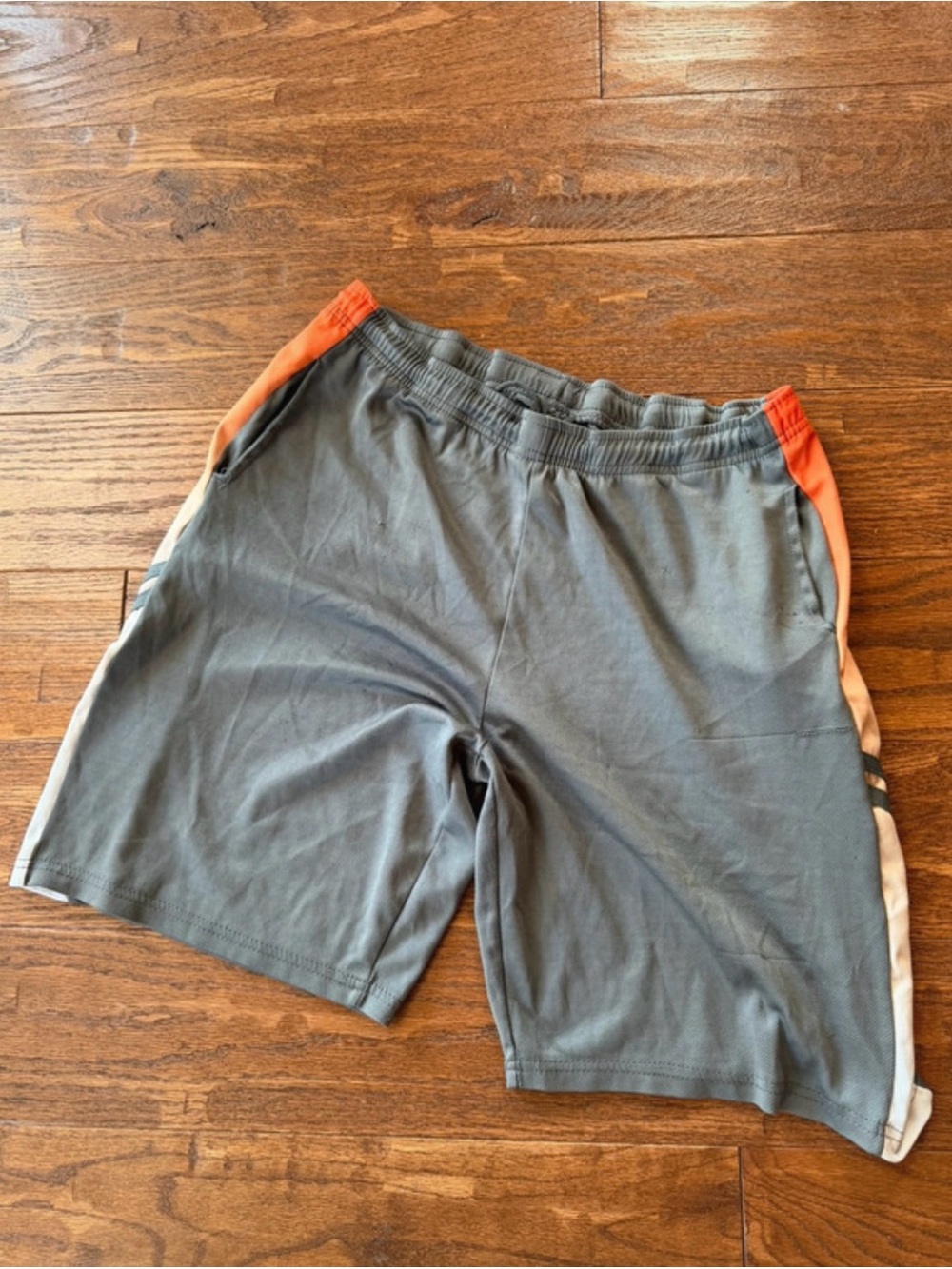 Nike Men's Gray Athletic Shorts with Orange Accent